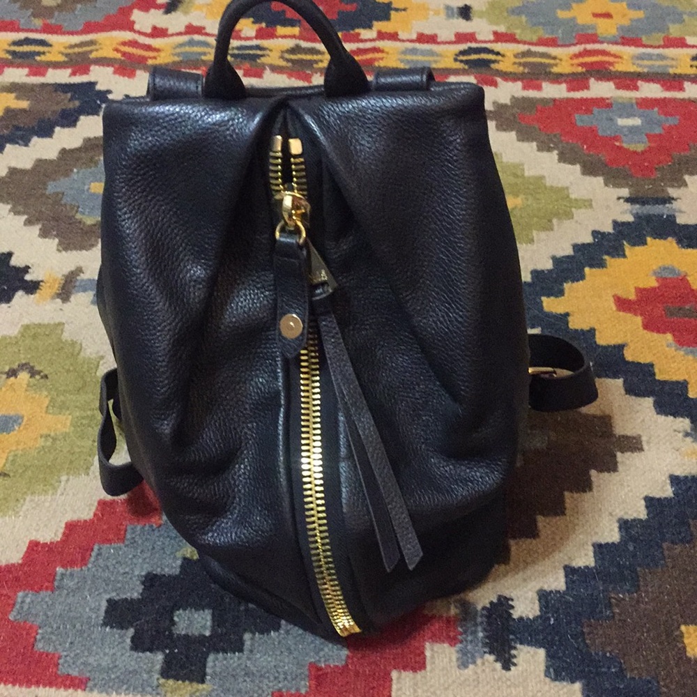 Aimee Westinburg--Black leather backpack